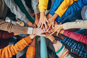 Friends gather at a community center, a Photo by Tanuart