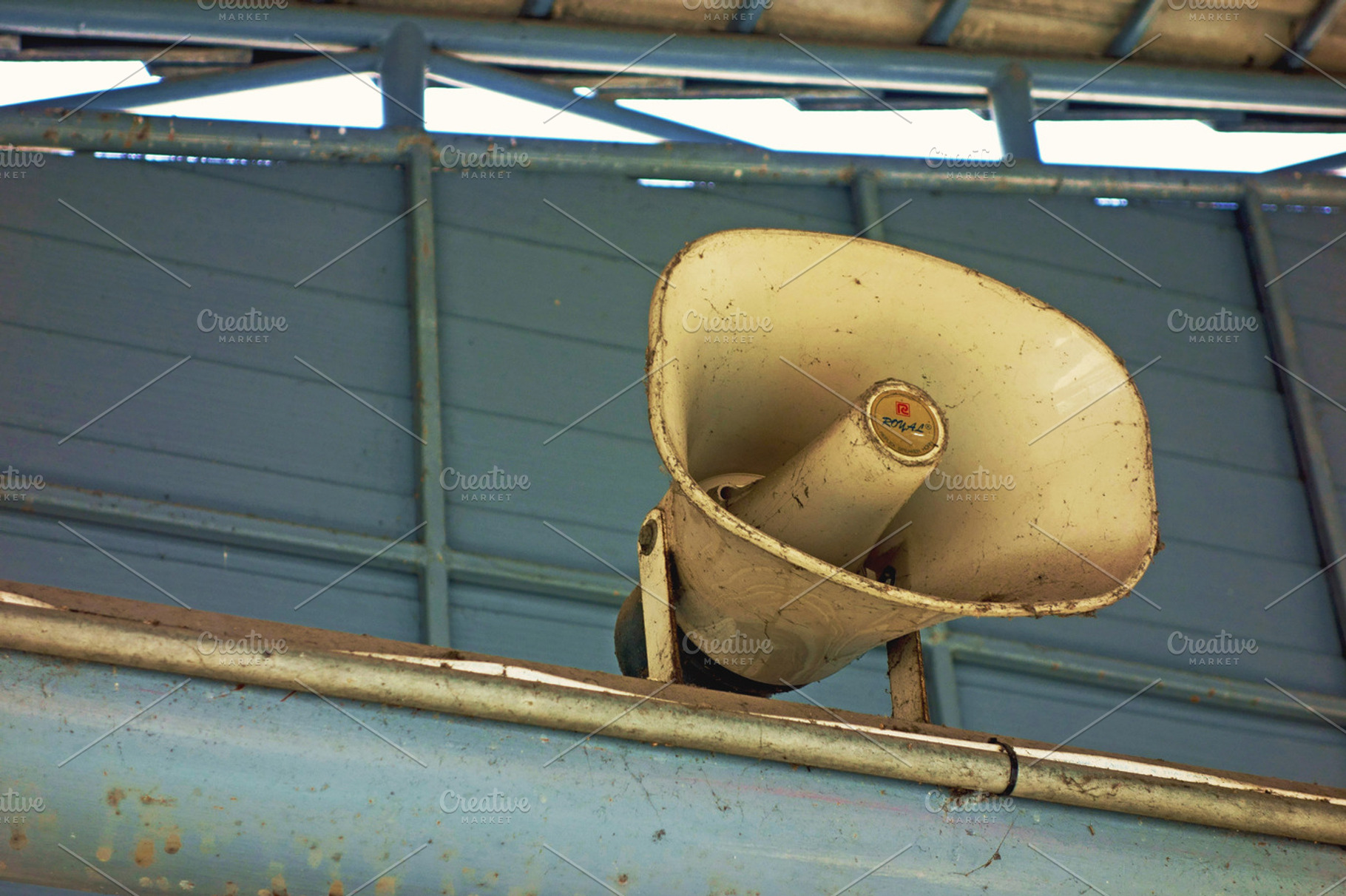 Megaphone containing speaker, megaphone, and announcement