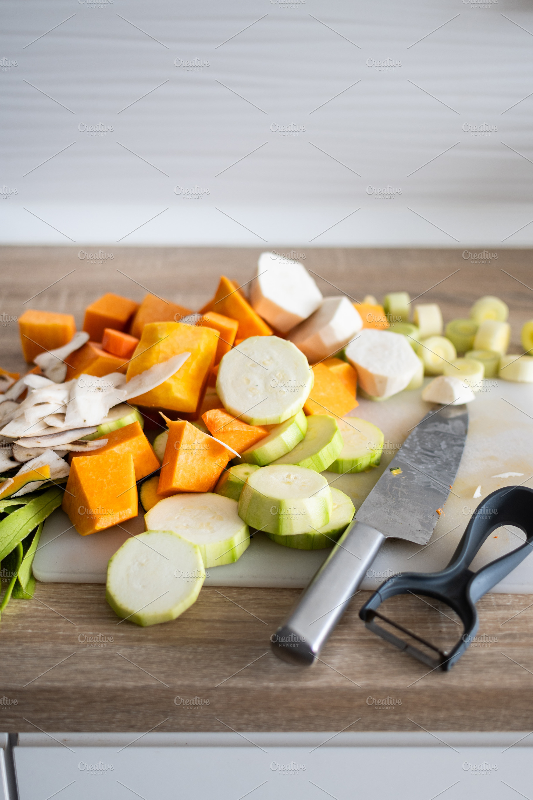 Fresh vegetables on cutting board with zucchini carrot potato and pumpkin, a Food & Drink Photo by etorres69