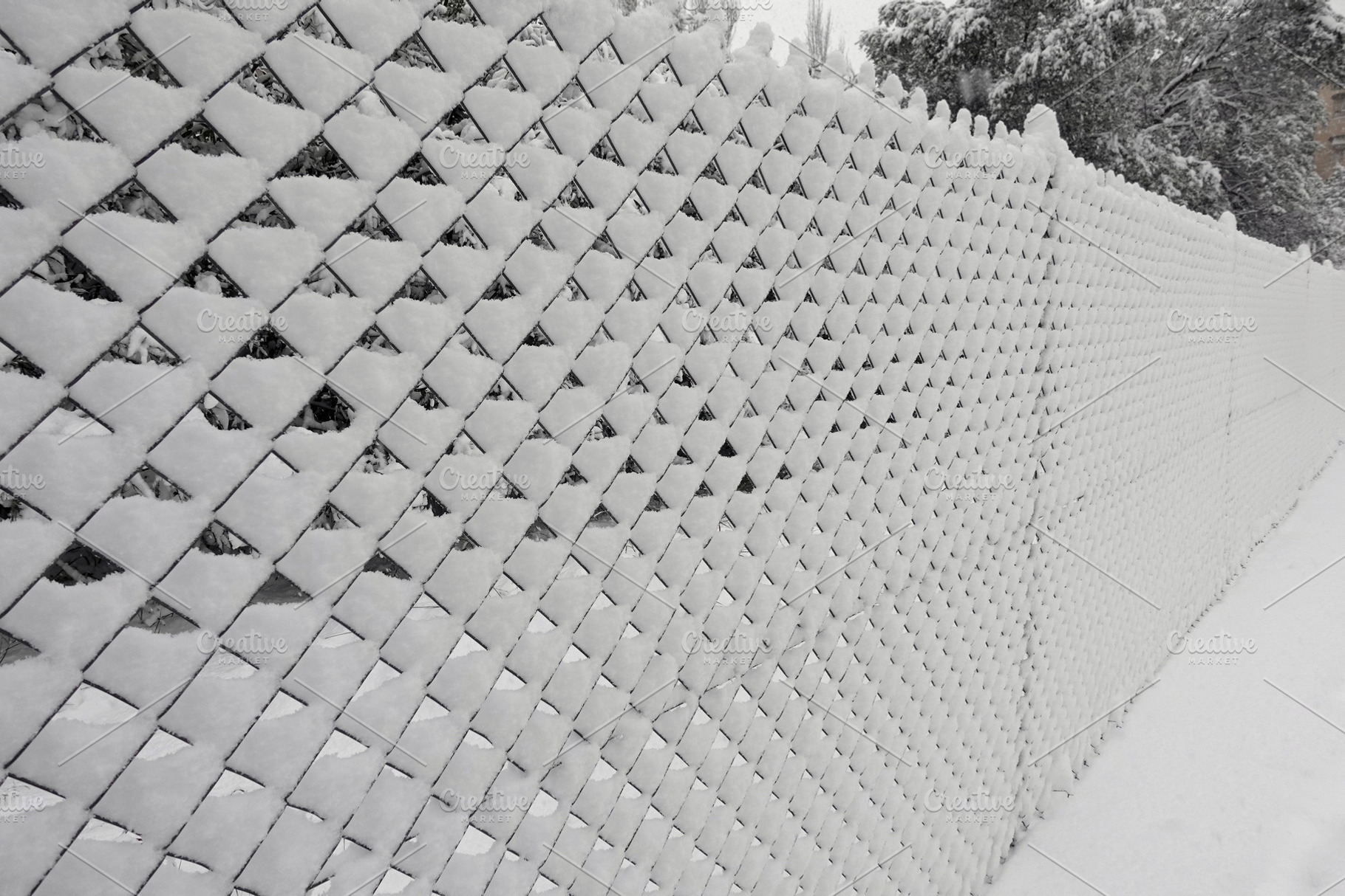 chain-link fence covered with snow, a Background Photo by sirylok