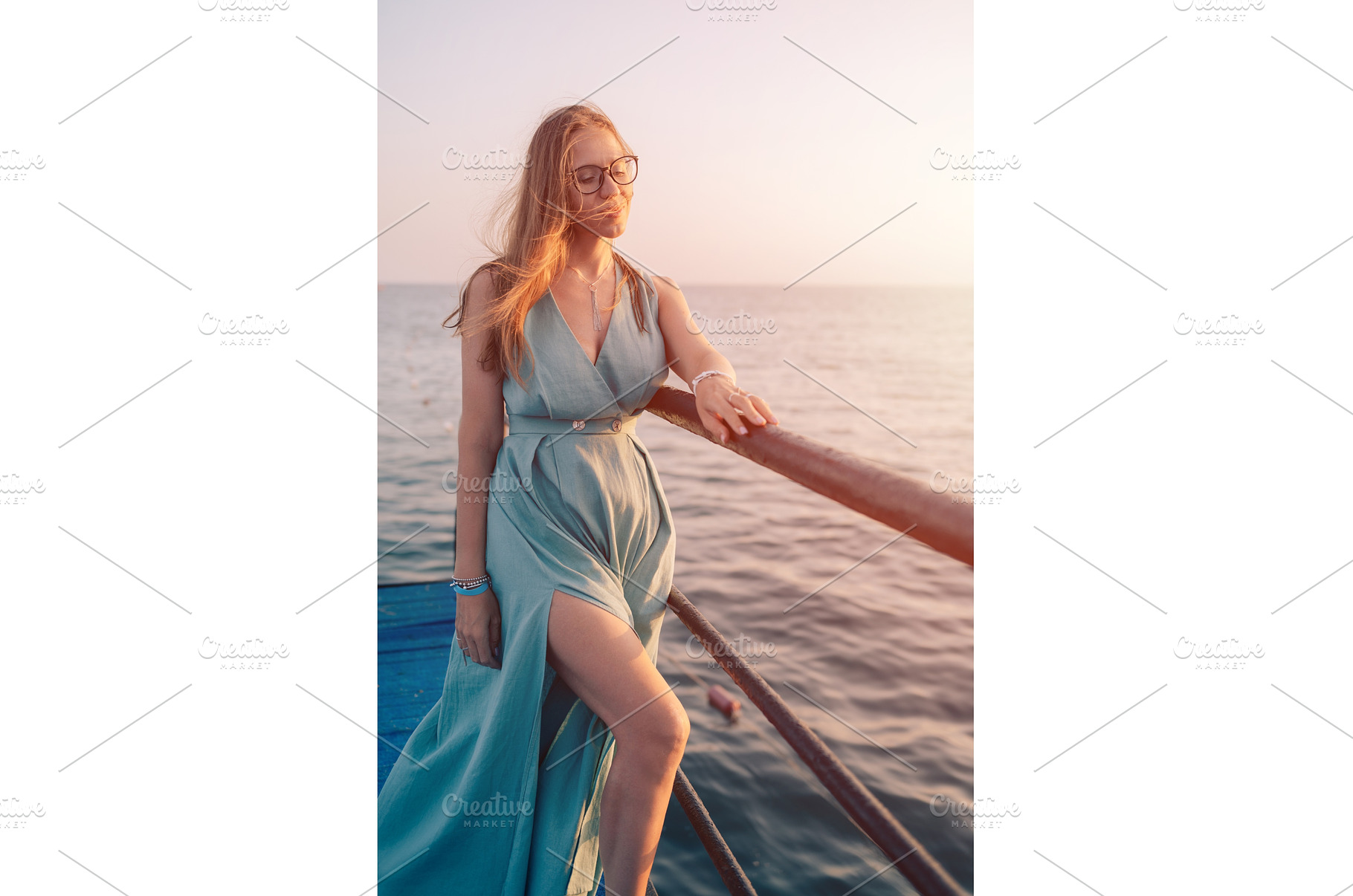 Woman in Flowing Dress on Seaside, a Person Photo by Jan Jack Russo Media