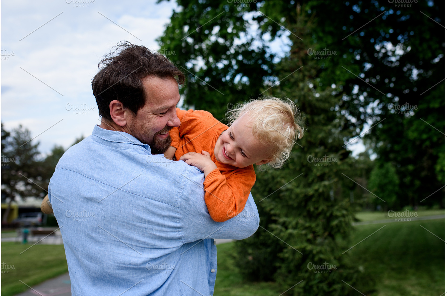 Father playing with toddler son, a Nature Photo by HalfPoint