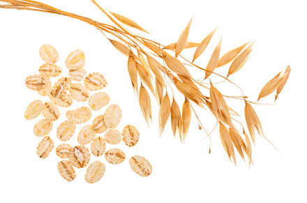 Oat spike with oat flakes isolated on white background top view stock photo, a Food & Drink Photo by NataPhoto