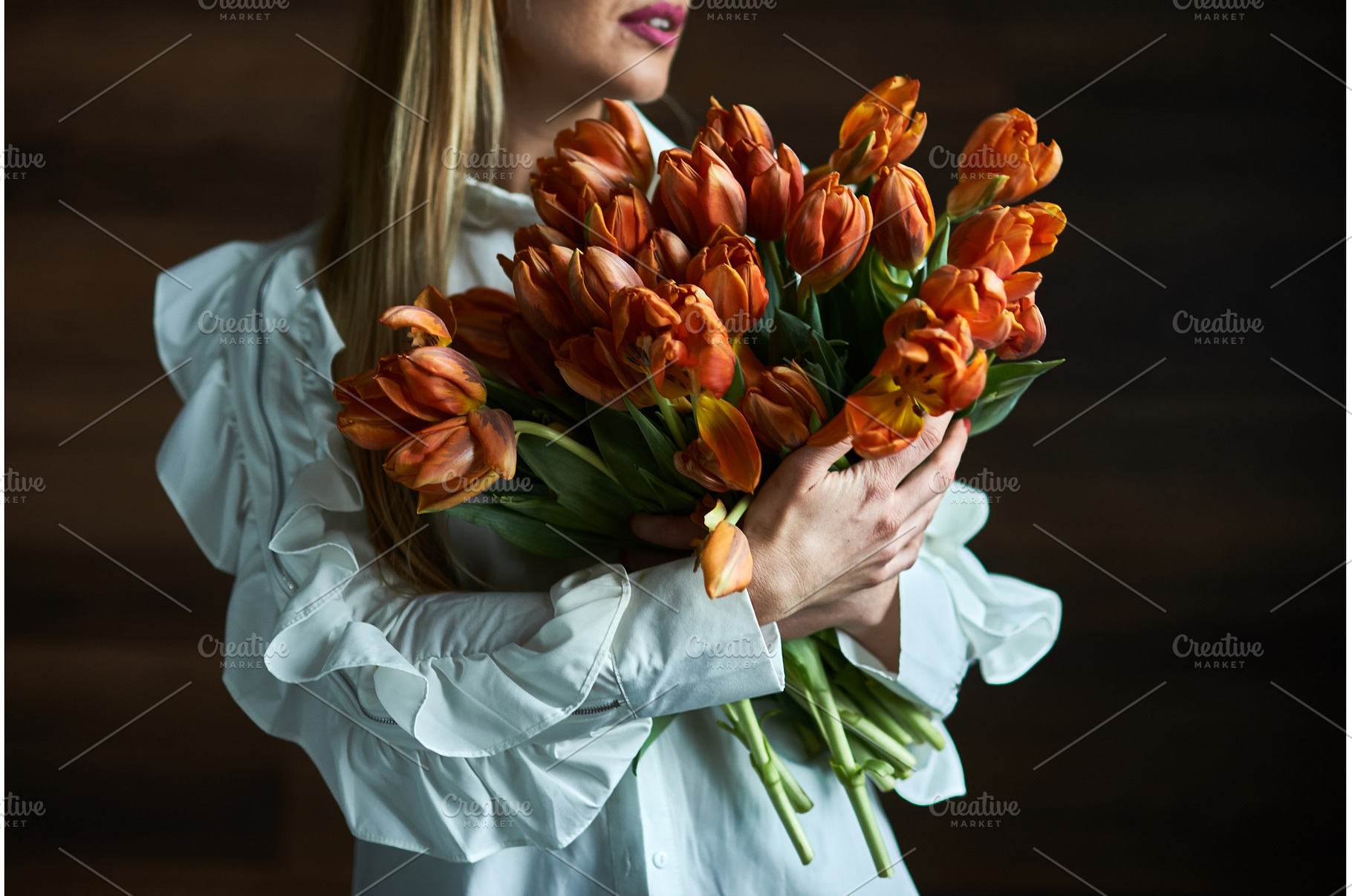 Woman Holding Lush Bouquet of Orange, a Beauty & Fashion Photo by wip3out