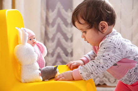 10 months old baby girl playing with toys. Portrait of a cute little girl, a Person Photo by Rohan Photography