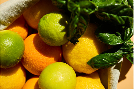 Fresh citrus fruits and basil