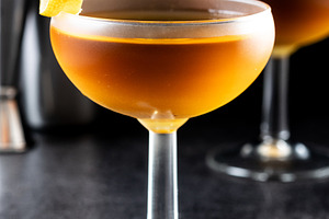 Paper plane cocktail on black slate background, a Food & Drink Photo by etorres69