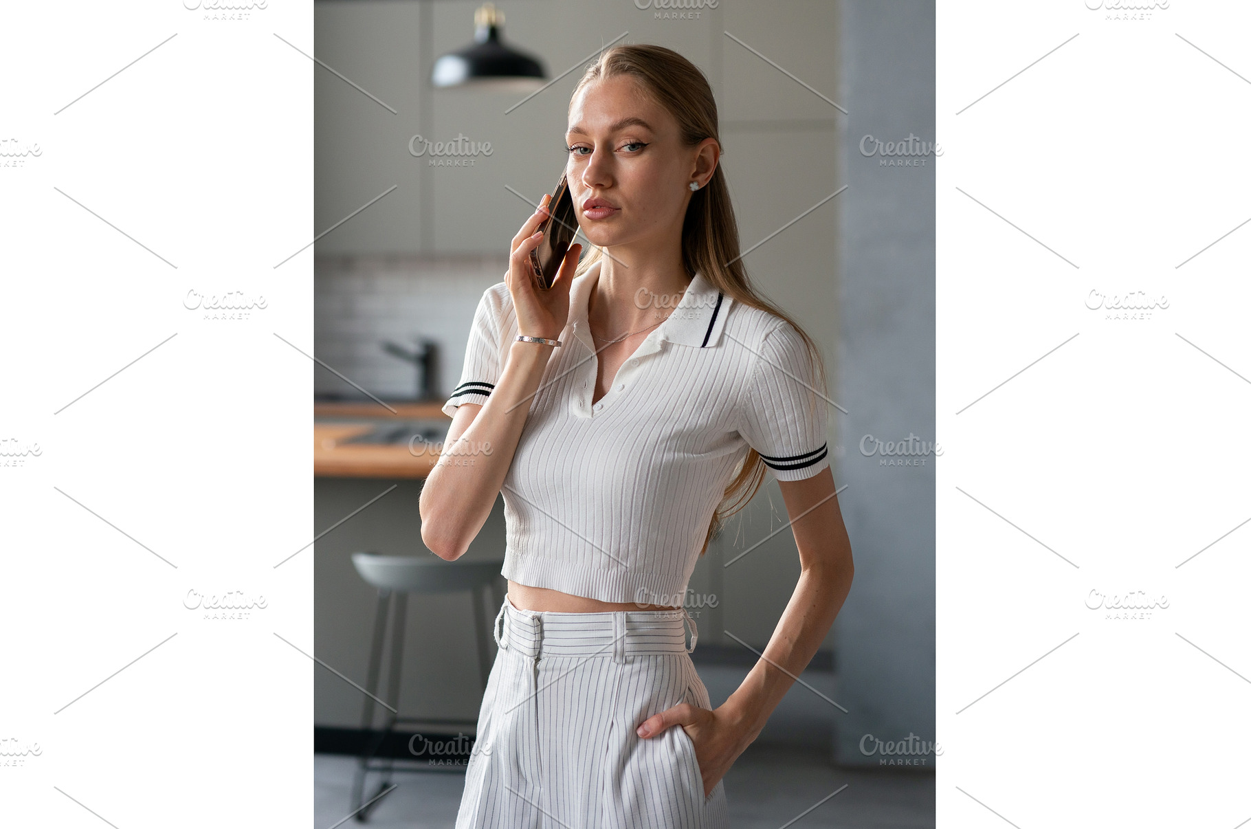 Young businesswoman with a phone at, a Person Photo by undrey