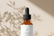 Amber Glass Dropper Bottle Mockup, a Packaging Mockup by Pixel Foundry (Thumbnail 2 of 6)