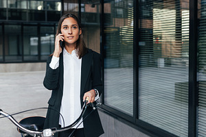 Confident female office worker, a Business Photo by Artem Varnitsin