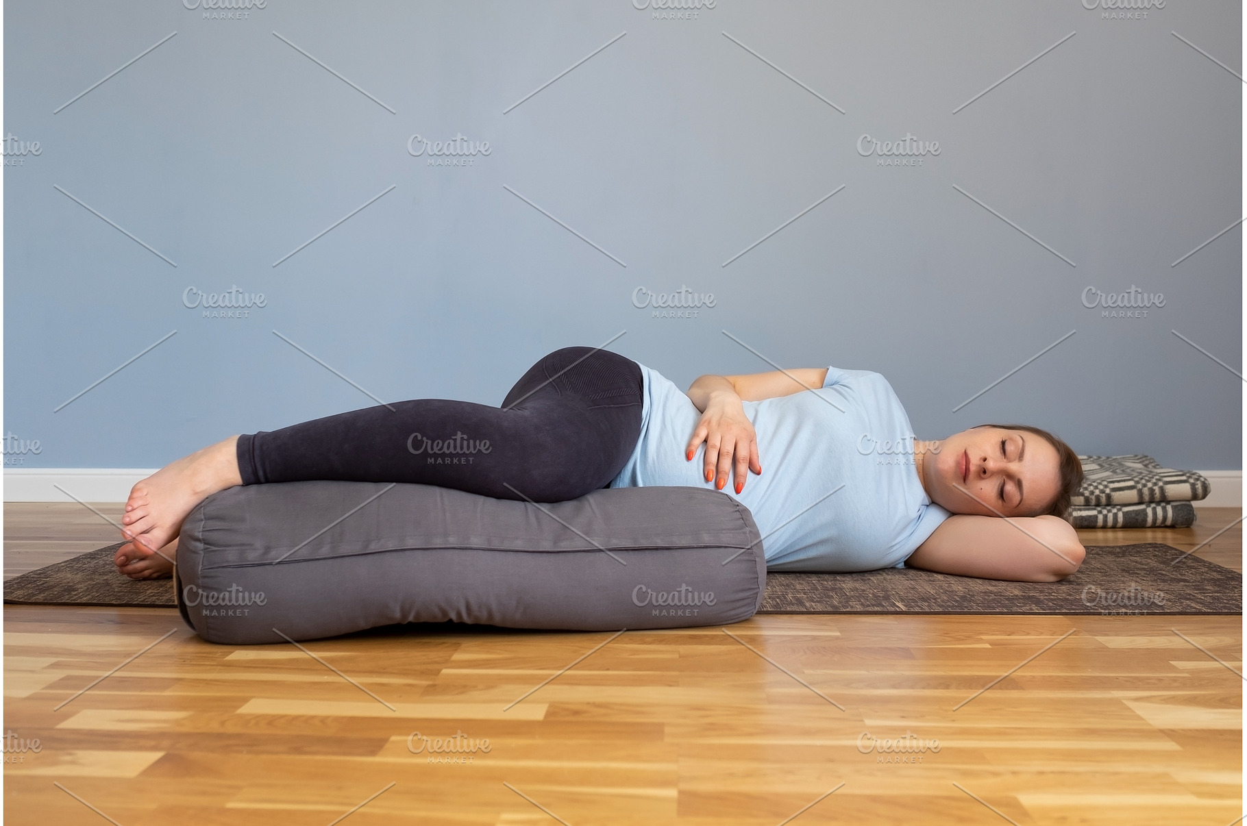 Pregnant woman lying in Shavasana, a Person Photo by Koldunov