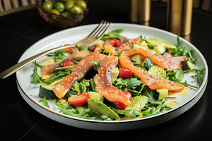 Salad with salted salmon and arugula, a Food & Drink Photo by Budarinphoto
