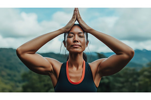 Asian woman practicing yoga outdoors, a Person Photo by Sergey Kotenev