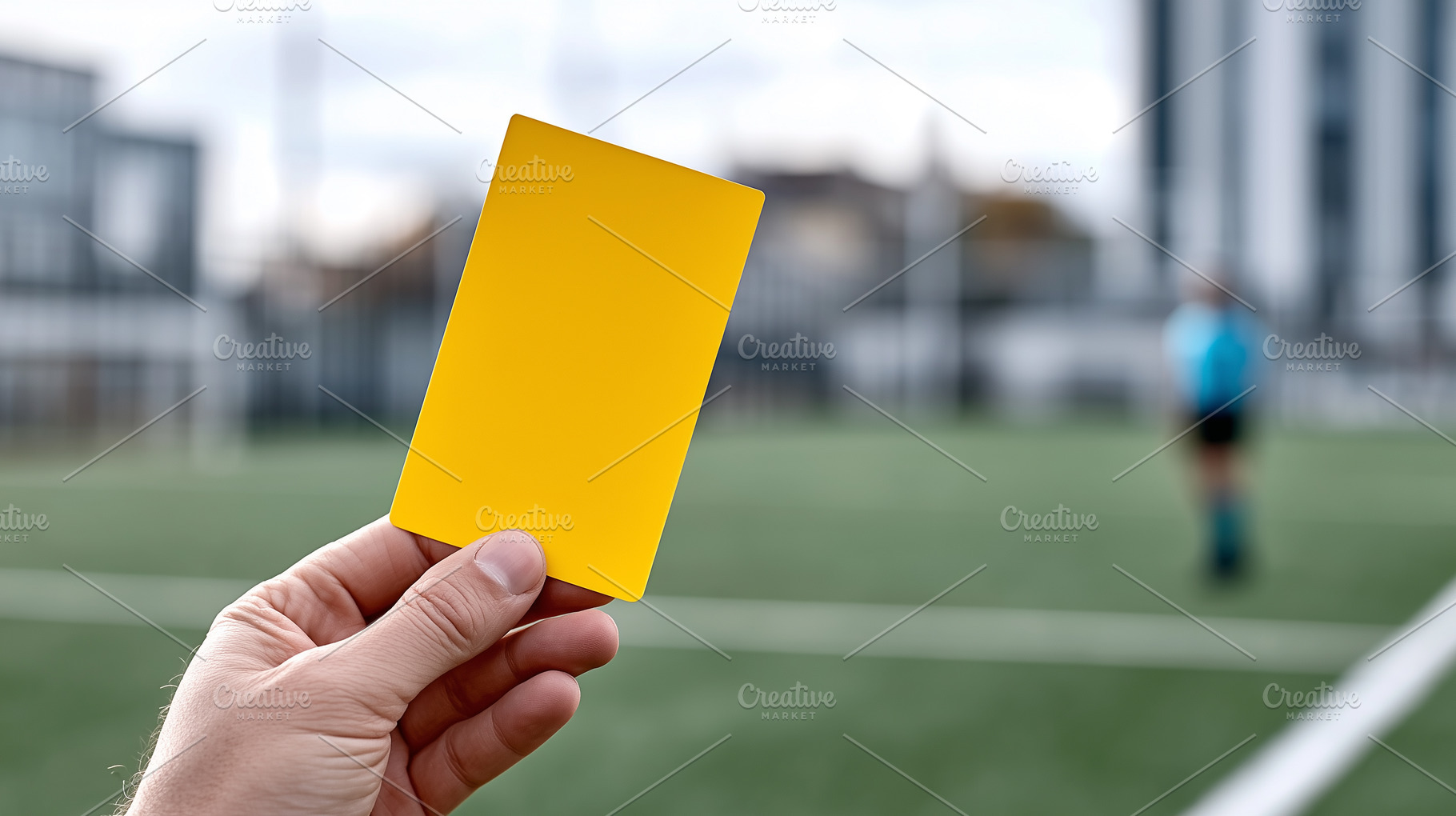 Hand holding a yellow card on soccer, a Sports & Recreation Photo by MistyDay
