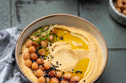 Traditional homemade chickpea hummus, a Food & Drink Photo by Marina_Pronina