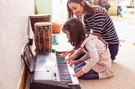Music making lesson containing acoustic, adorable, and artist, a School & Education Photo by oksix
