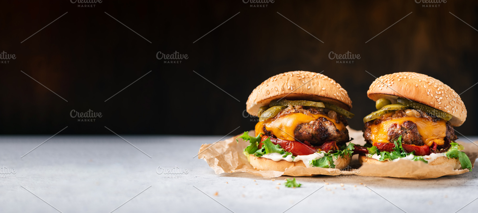 Two delicious craft cheeseburgers, a Food & Drink Photo by The baking man