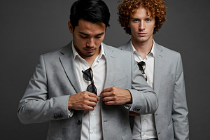 Two Stylish Men in Suits Posing in S, a Beauty & Fashion Photo by Stock Shape