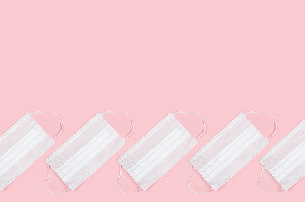 Many medical masks on the pink containing pink, epidemic, and pattern, a Health & Medical Photo by Northern Life