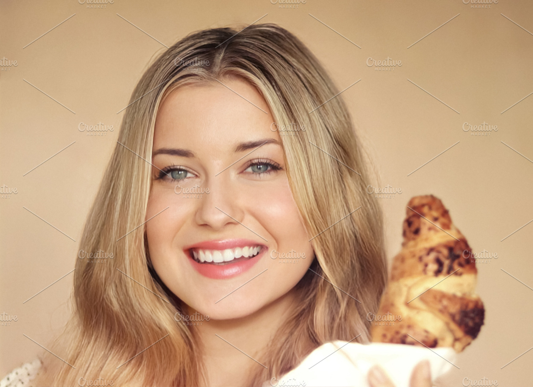 Young woman smiling with blonde hair and blue eyes, holding a de, a Person Photo by Studio ANNA