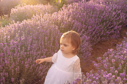 Beautiful babygirl in a white dress
