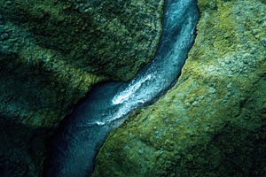 River flows through green landscape, a Photo by Beautiful things