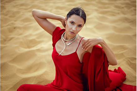 sexy brunette woman in a red long, a Person Photo by SaulichPhoto