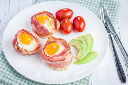 Baked eggs with avocado in bacon cups for breakfast, a Food & Drink Photo by iuliia_n