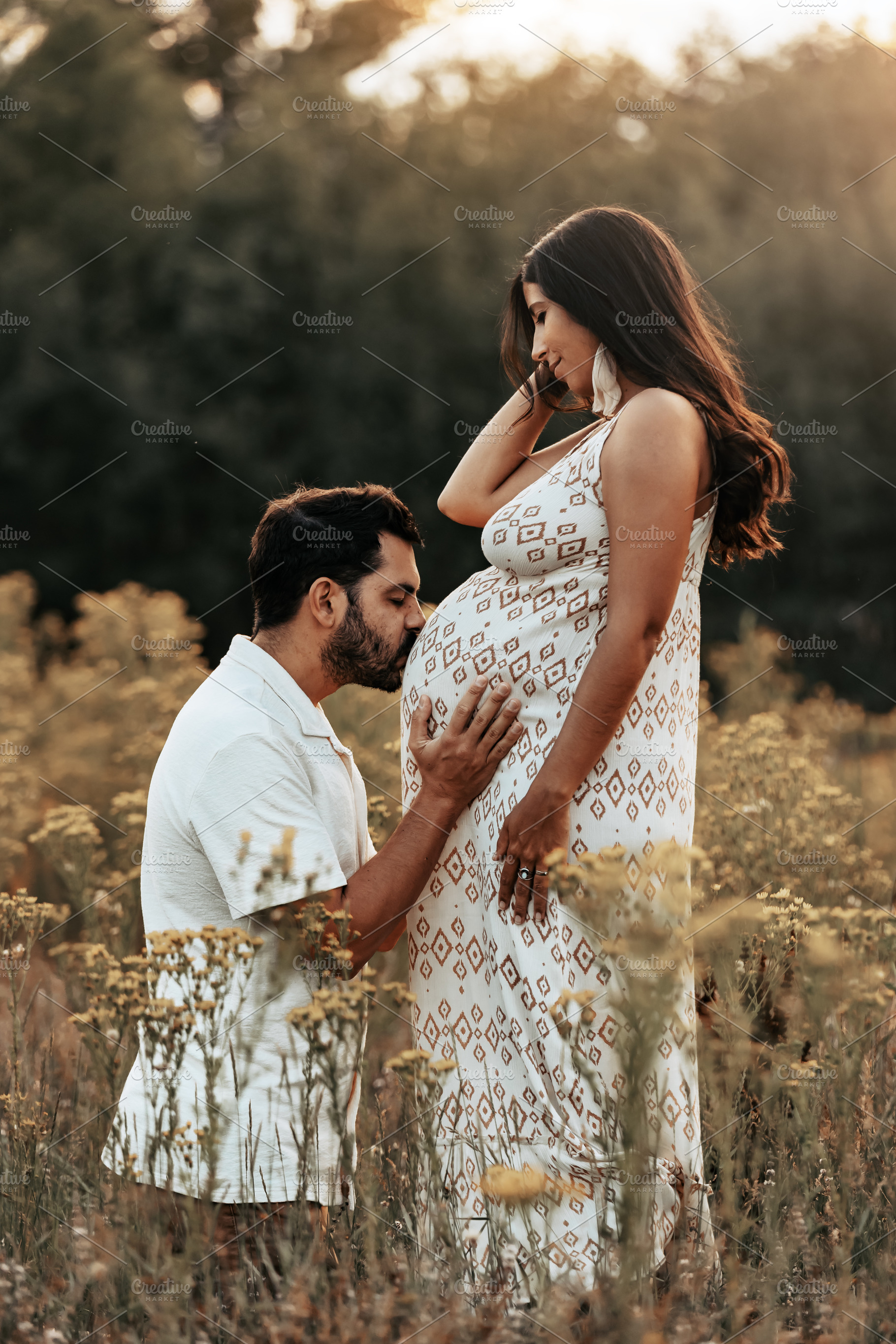 Couple expecting a baby in a flower, a Person Photo by Perpis