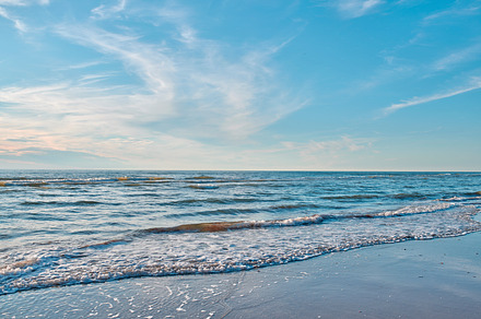 Calm beach and sea, a Photo by Peopleimages.com