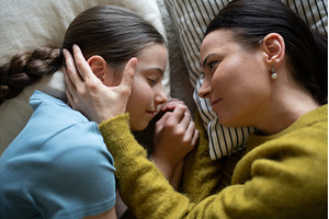 Top view of girl and mom talking in, a Person Photo by HalfPoint