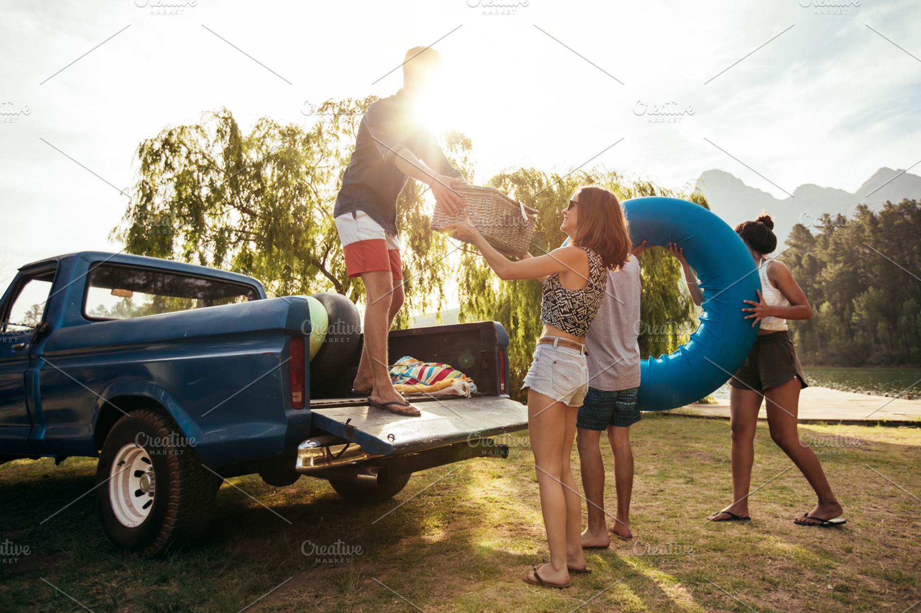 Young friends unloading pickup truck, a Person Photo by Jacob Lund ...