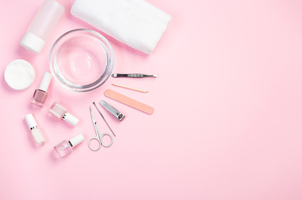 Spa set, manicure or pedicure equipment with nail coat or polish, on pink backg, a Beauty & Fashion Photo by iuliia_n
