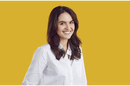 Smiling shy brunette woman in white, a Person Photo by StudioRomantic