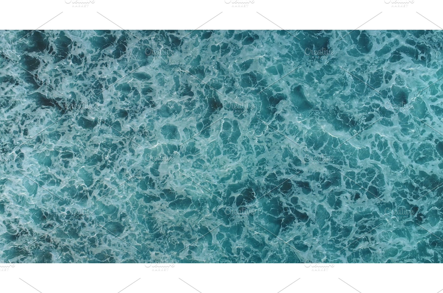 Turquoise ocean water surface with, a Nature Photo by Goinyk