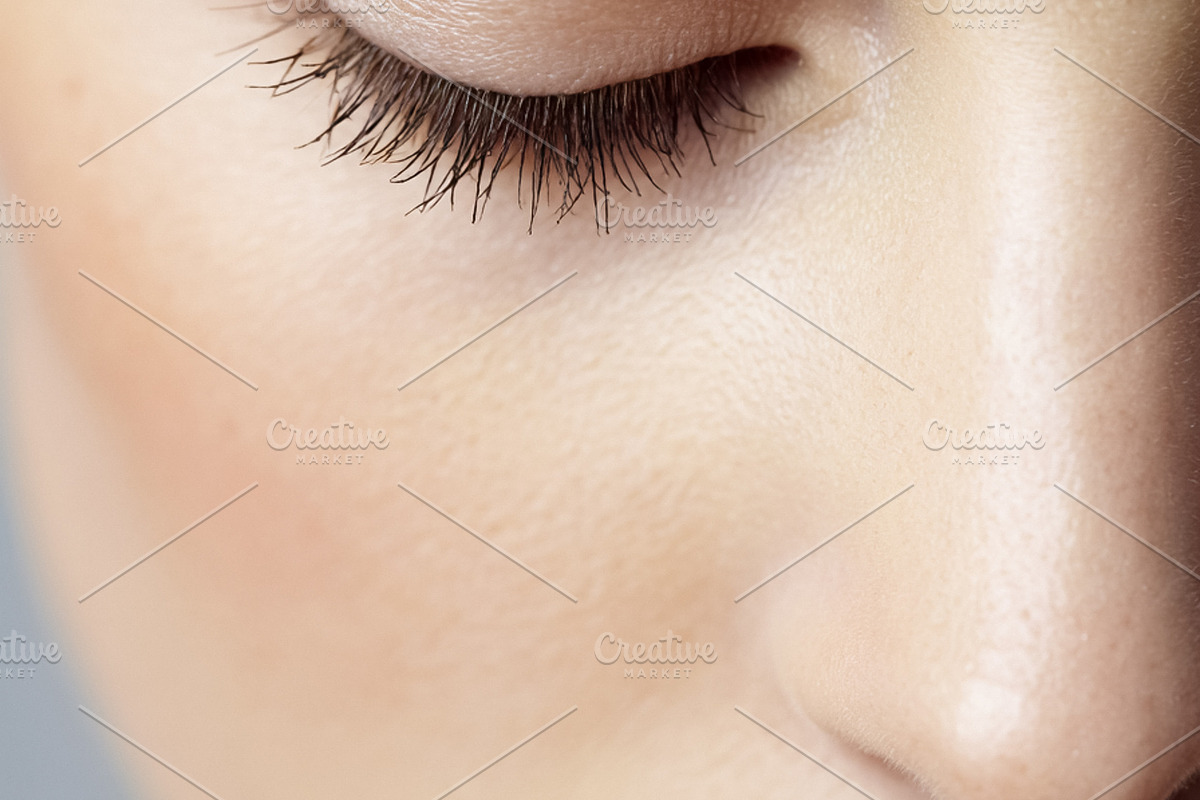 Young woman showing delicate skin texture, closed eye with long, a Beauty & Fashion Photo by Studio ANNA (Photo 2 of 2)