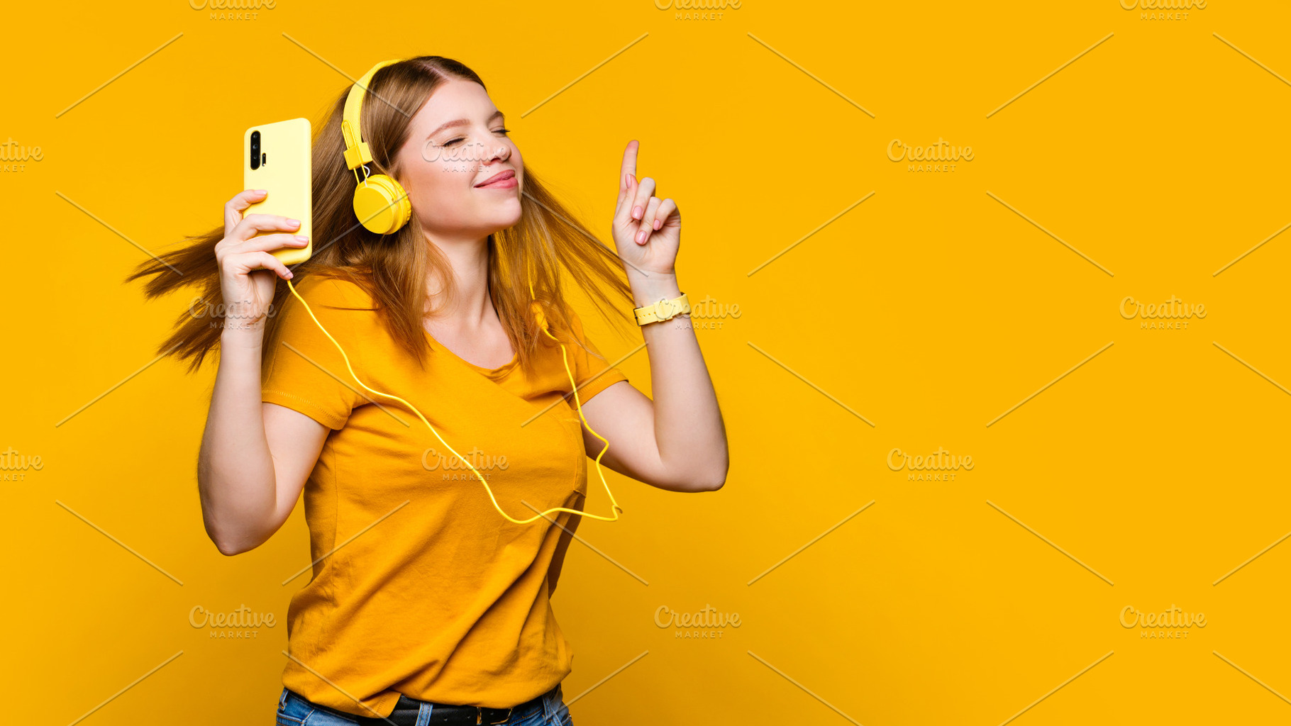 Girl in headphones with phone, a Technology Photo by Elena Vagengeim