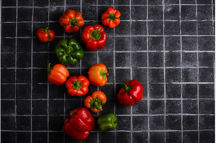 Colorful bell pepper on black, a Food & Drink Photo by Yulia Furman