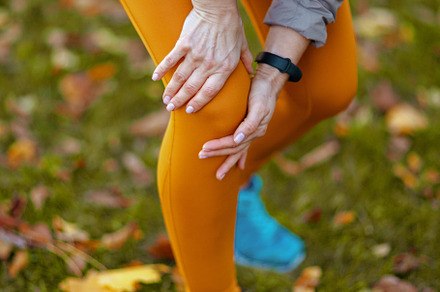 Closeup on woman in fitness clothes in park, a Sports & Recreation Photo by Alliance Images