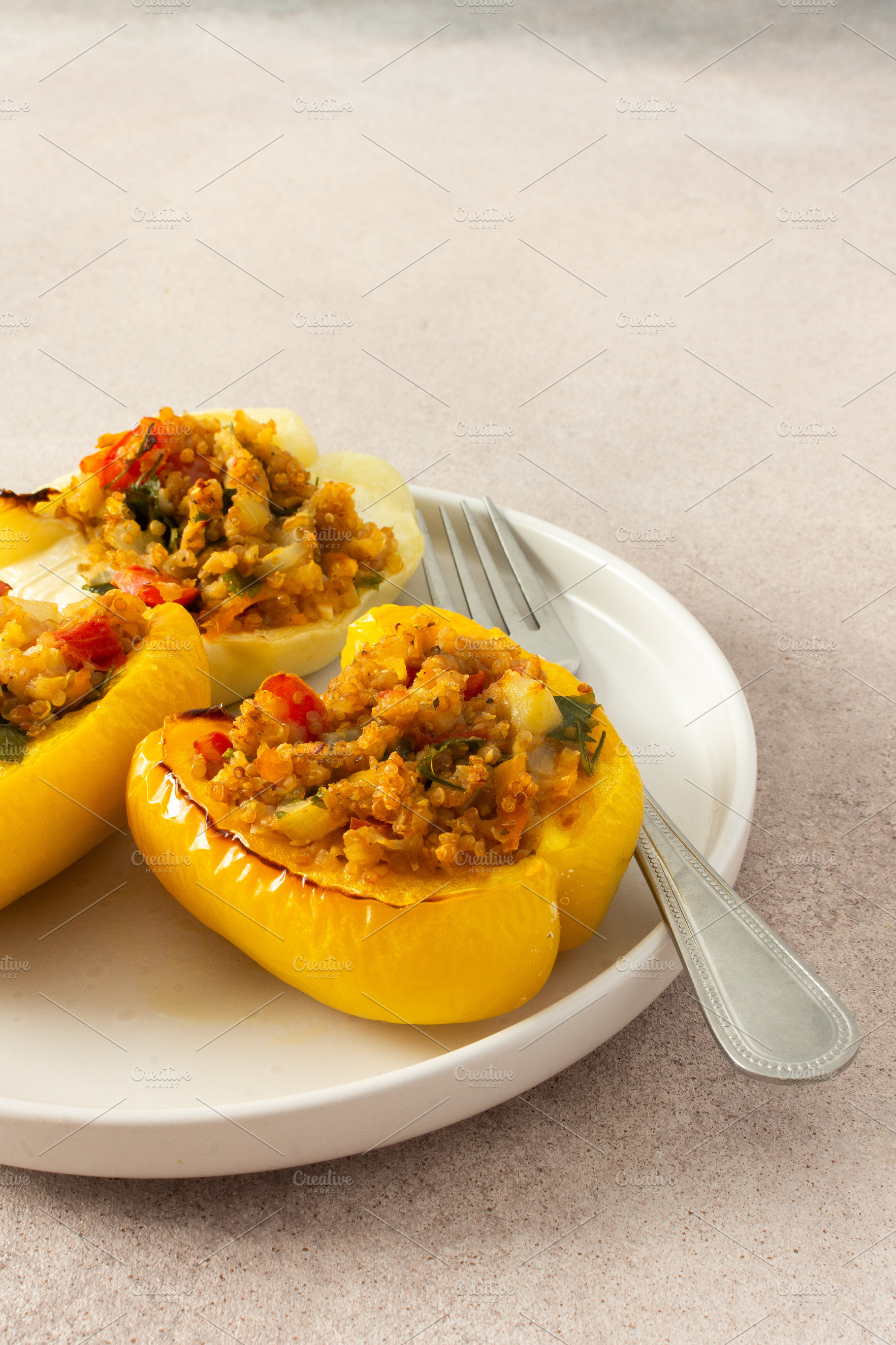 Stuffed bell peppers with quinoa, a Food & Drink Photo by Pundateam