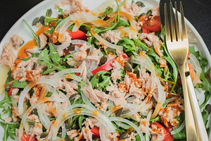 Fresh Tuna Salad with Onions and Cherry Tomatoes. Italian Mediterranean Cuisine, a Food & Drink Photo by Budarinphoto