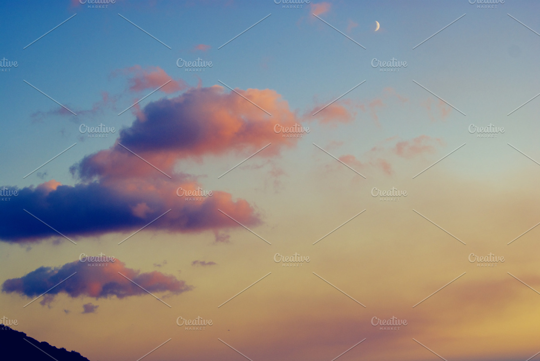 Sunset and moon stock photo containing sunset and gloden hour