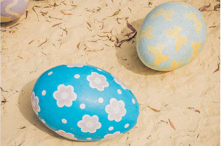 Multicolored eggs in the grass, a Holiday Photo by Elizaveta Galitskaya