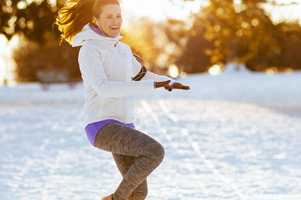 Full length portrait of happy fit woman in white jacket workout, a Person Photo by Alliance Images