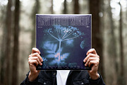 Outdoor Vinyl Record Cover Mockup, a Product Mockup by Design Squad (Thumbnail 1 of 4)