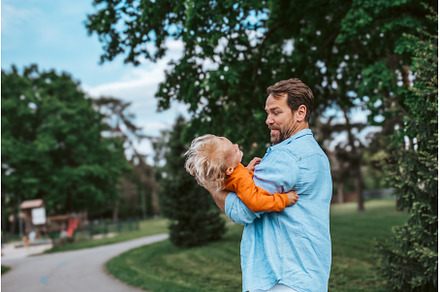 Father playing with toddler son, a Nature Photo by HalfPoint