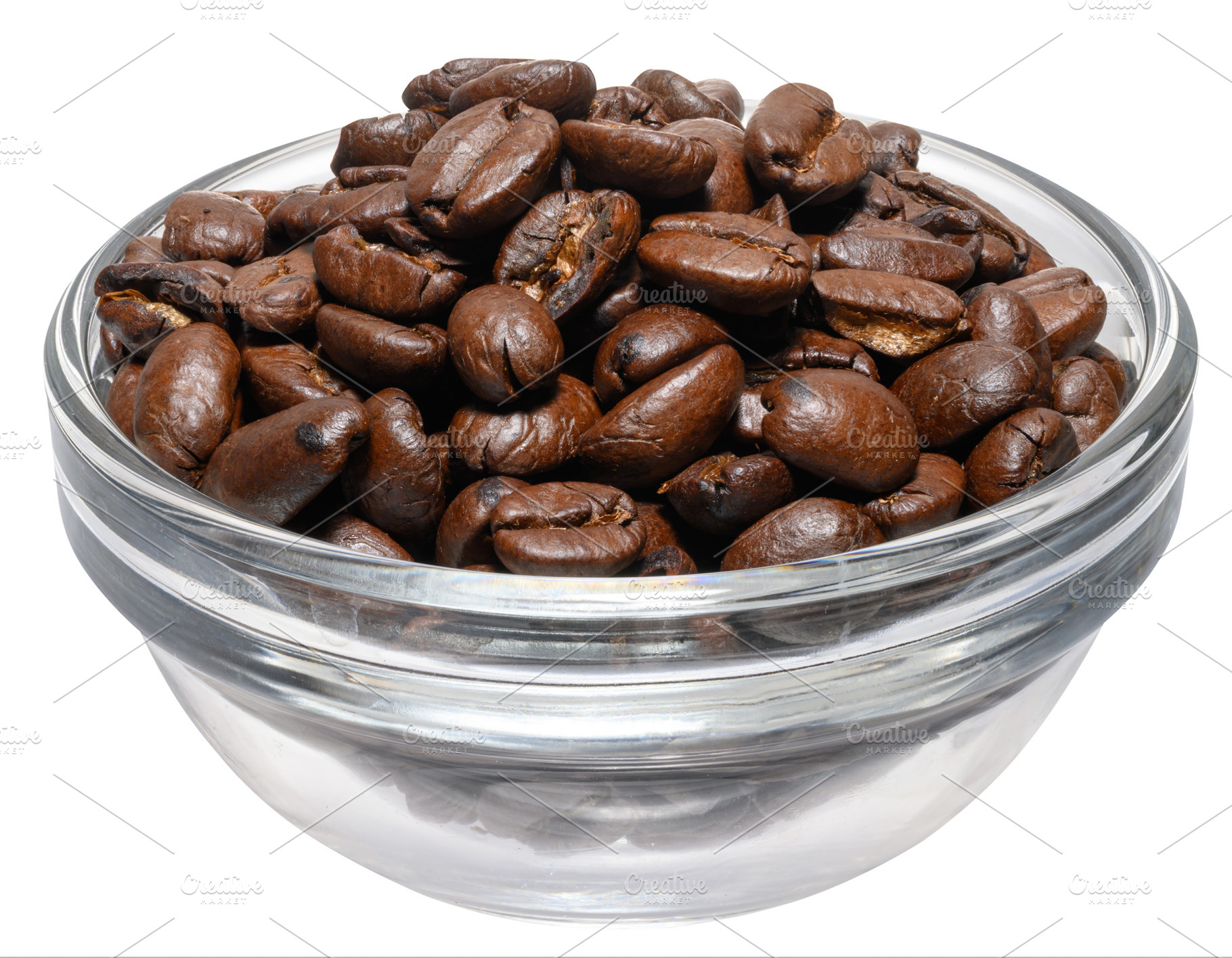 Roasted ground coffee in glass transparent bowl on isolated back, a Food & Drink Photo by ndanko