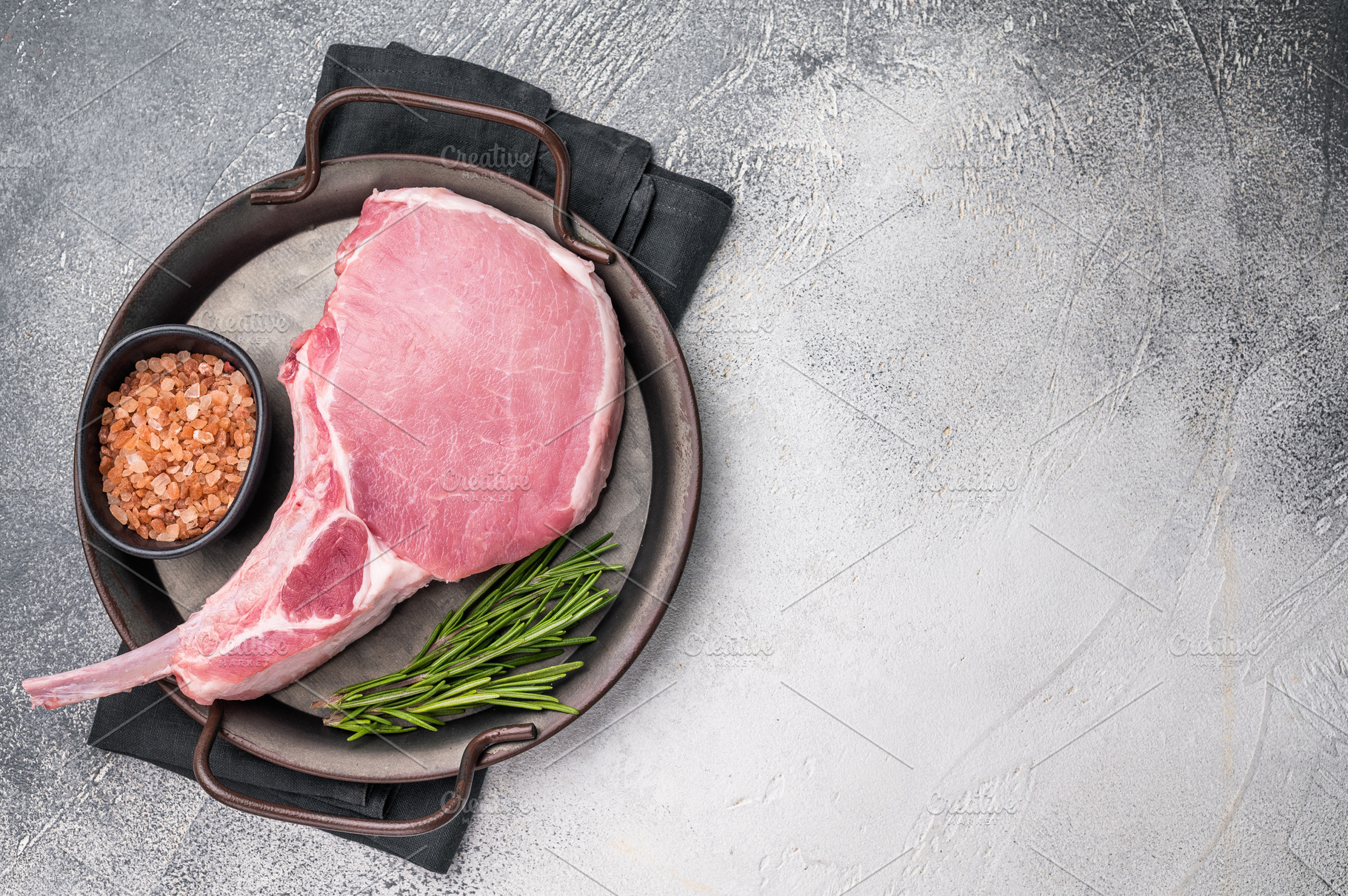 Raw pork rib chop steak, highlighting the rich texture and flavo, a Food & Drink Photo by composter-box@mail.ru