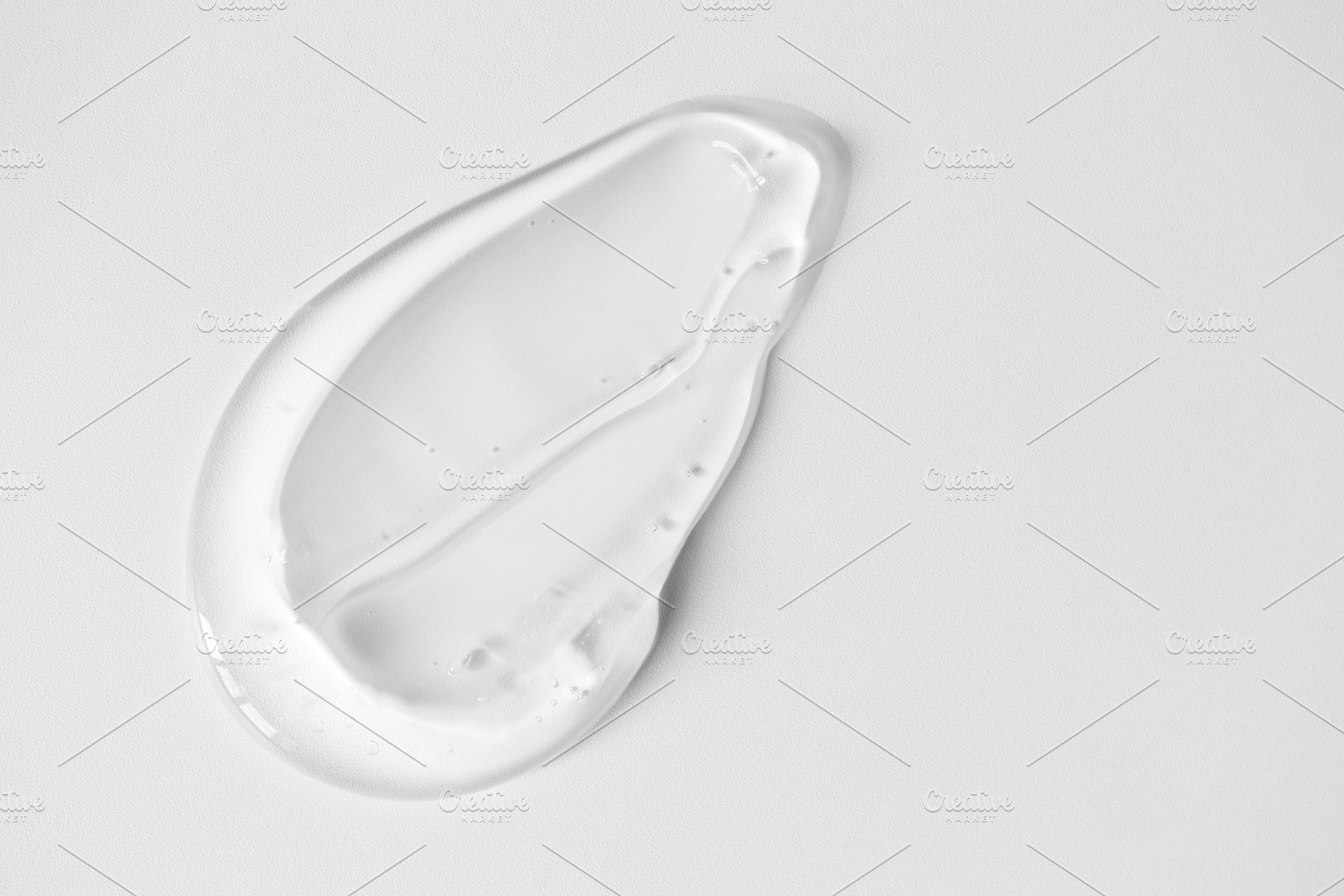 Close-up aloe gel smear on white, a Health & Medical Photo by Olha Kozachenko