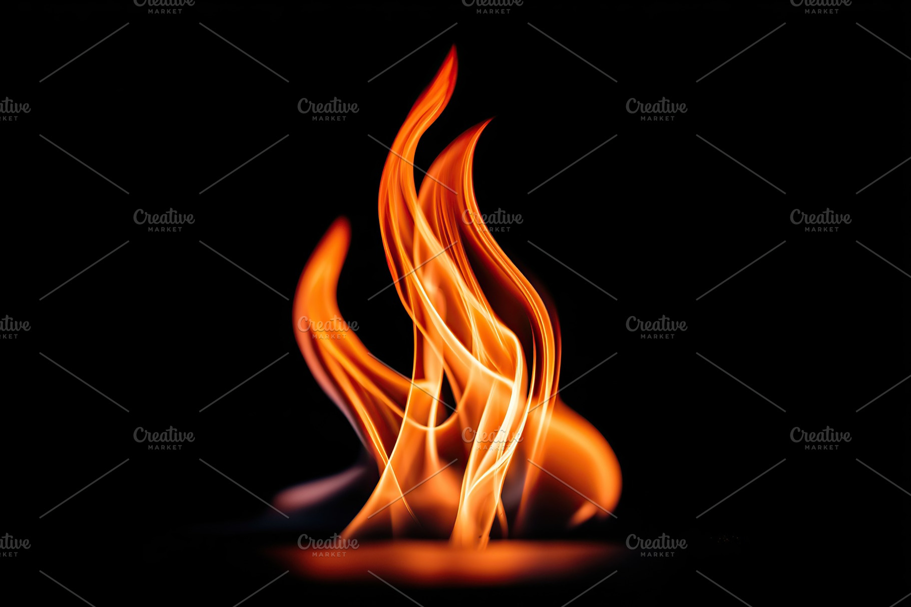 Flames dance elegantly in the dark showcasing vibrant orange and yellow hues, an Arts & Entertainment Photo by AlyaAnd